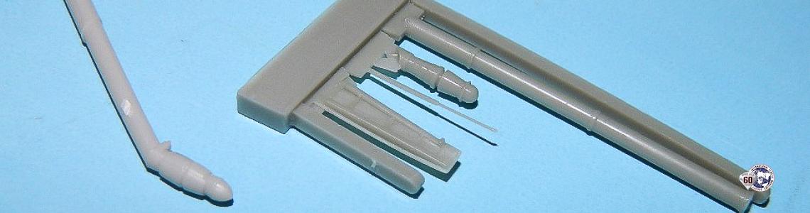 Resin Parts (On Casting Block) Compared to Kit Probe and Door