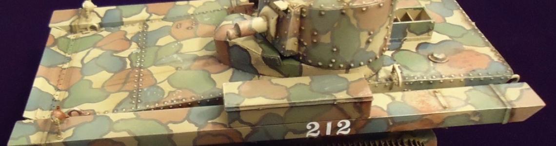 Complete tank with elaborate camouflage paint scheme.