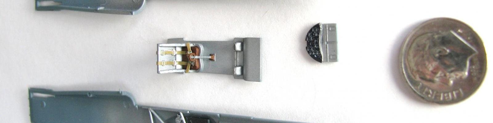 Cockpit assembly - in relation to the size of a dime.