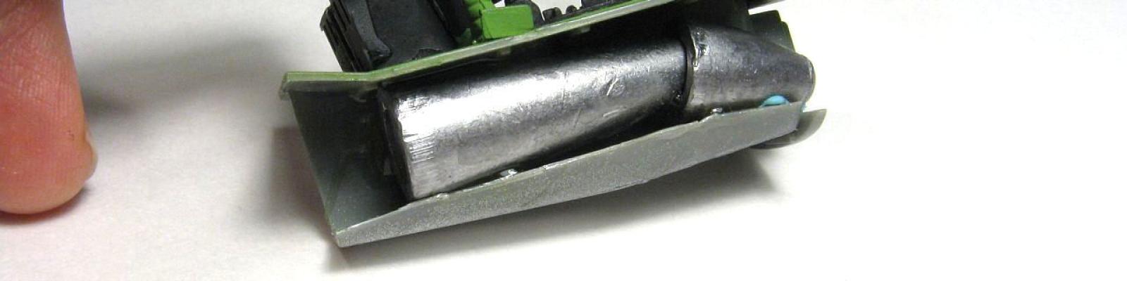 Additional nose weight beneath cockpit deck