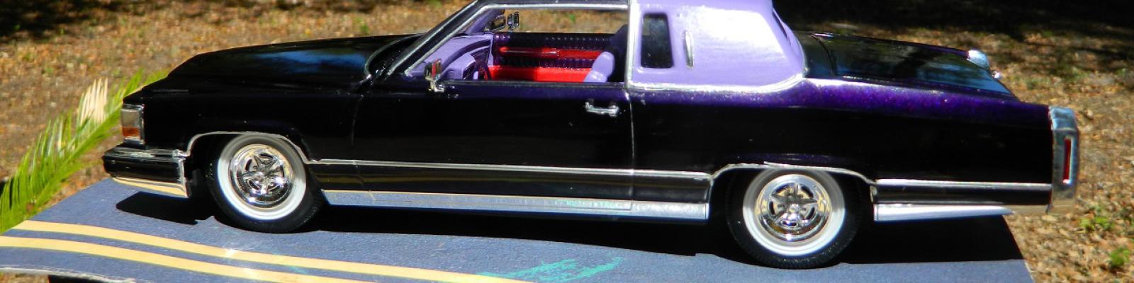 Image of car on pavement in sunlight showing off the House of Color Purple Kandy vinyl top
