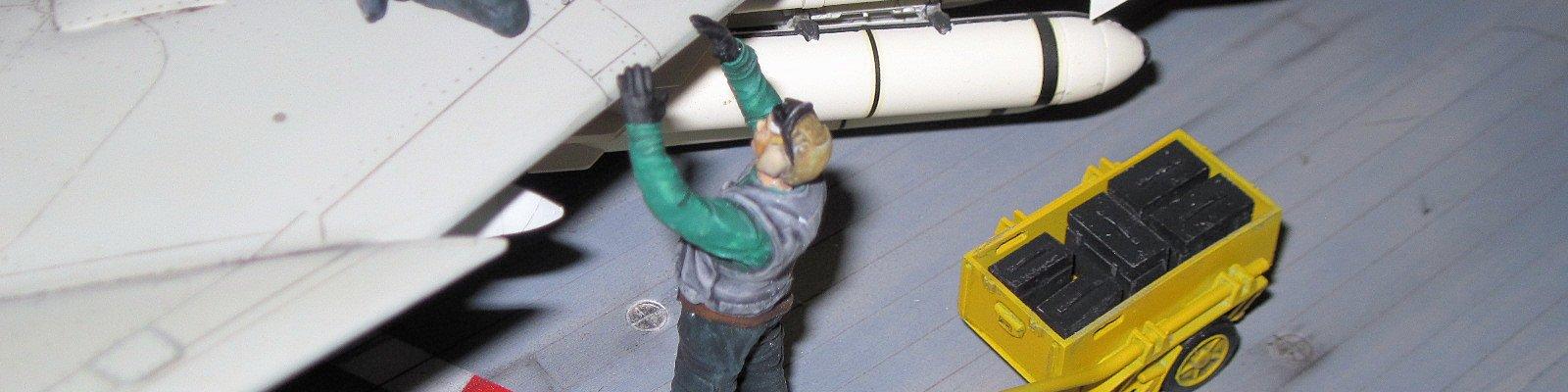 Working on an F-4 on the deck