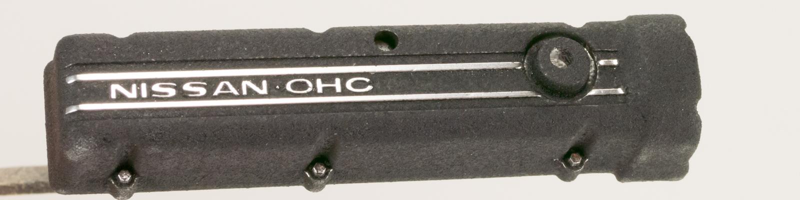 Rocker cover w/ faux fabric spray