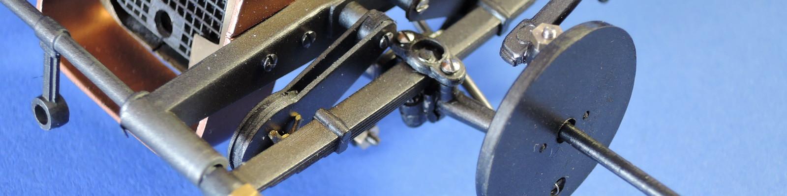 Front suspension includes a complicated series of assemblies