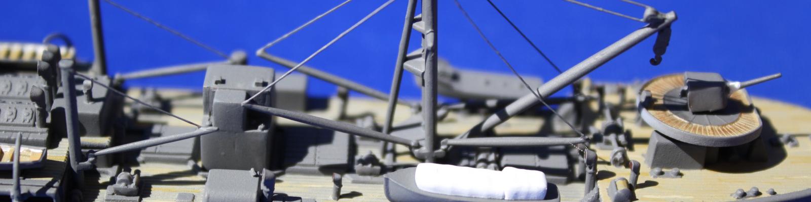 Close-up of aft cargo deck showing cables for spars from thin brass rod