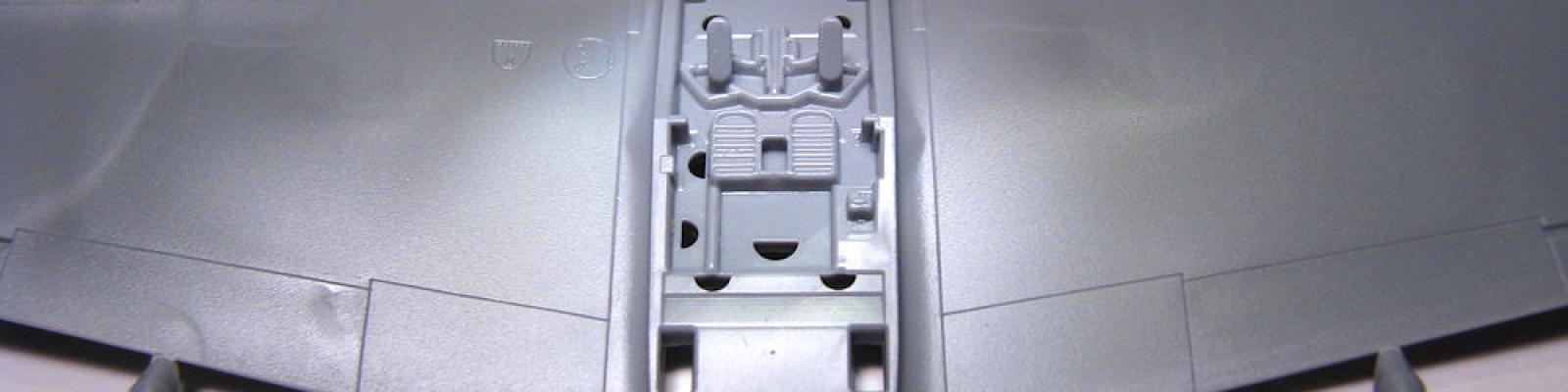 Cockpit floor integral with wings