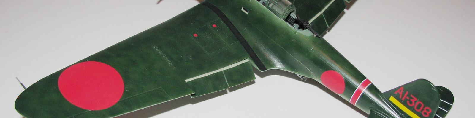 Kate, left-rear view, giving you a glimpse of the cockpit, wing detail, and lowered flaps.
