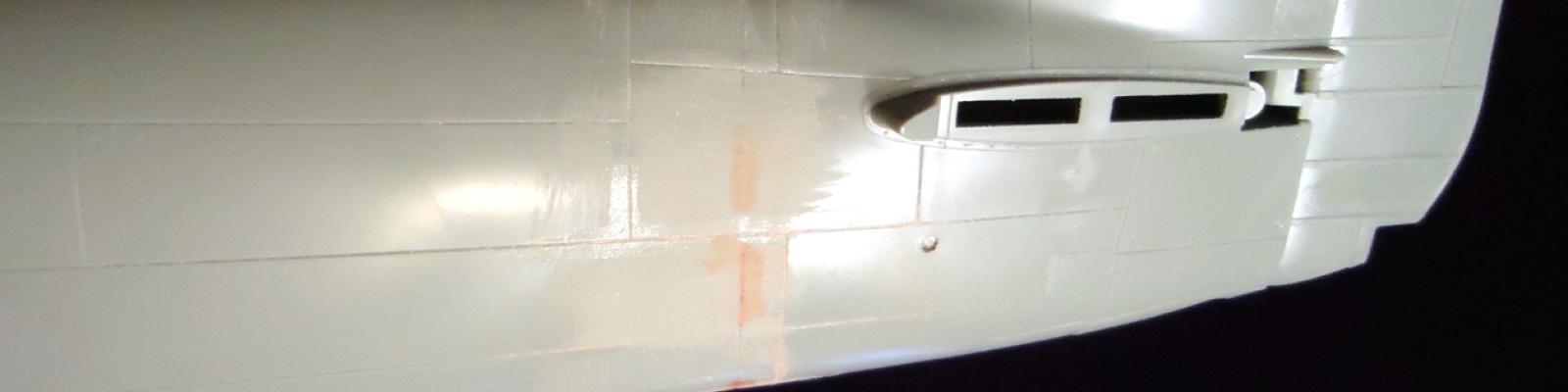 Due to separate tail, sanding on the joint was required, and the tiny holes for the rudder actuator have been drilled out.