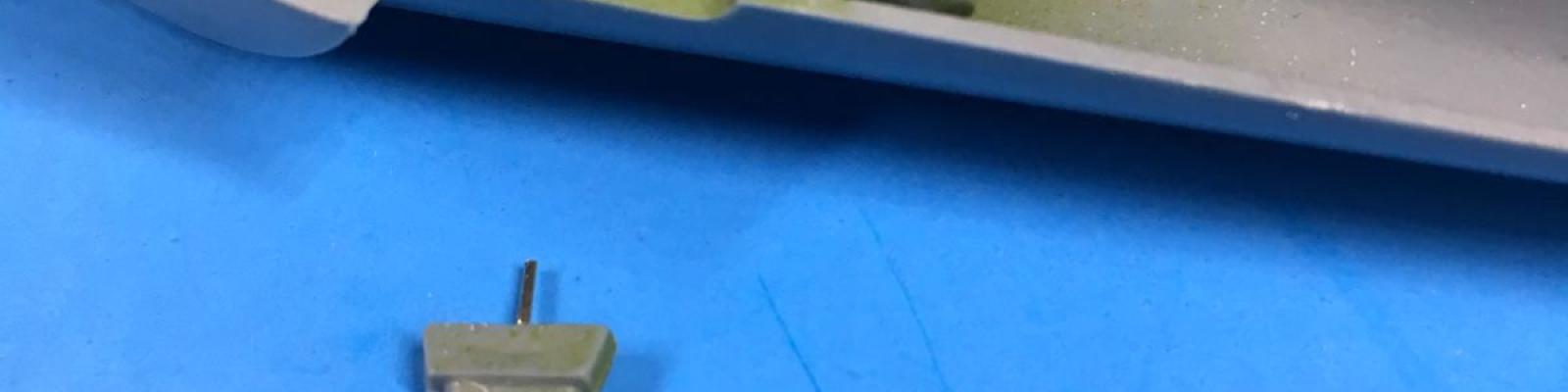 Tail wheel pin, note white plastic stock bulkhead brace above
