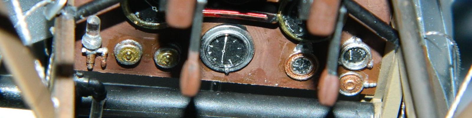 Instrument panel and gun charging handles