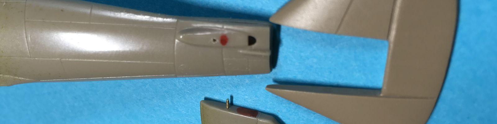 Horizontal tail surface with pins added and vertical tail fin modifications