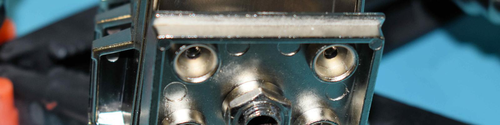 Baseplate secure to spine