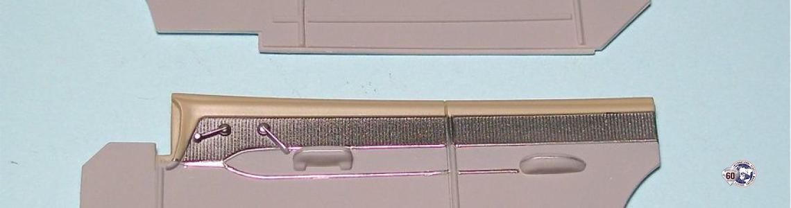 Basic painted door panel; bottom: panel trimmed with foil and silver paint on handles