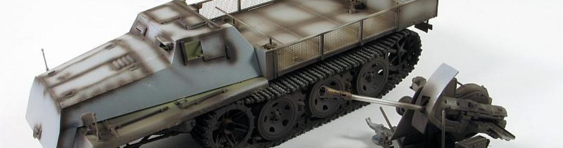 Assembled vehicle and gun assembly