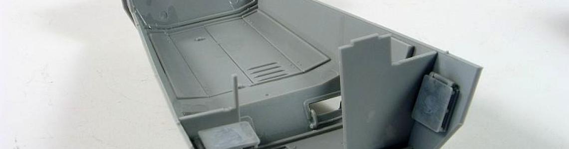 Driver cab and front assembly view from underside