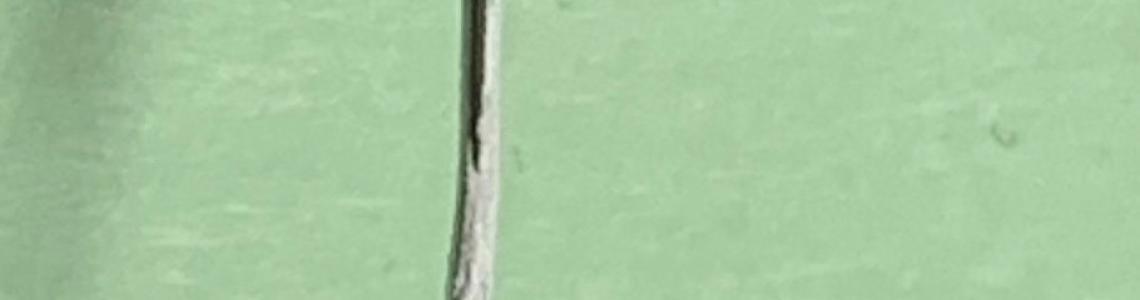 Main Gear Retraction Strut Warped