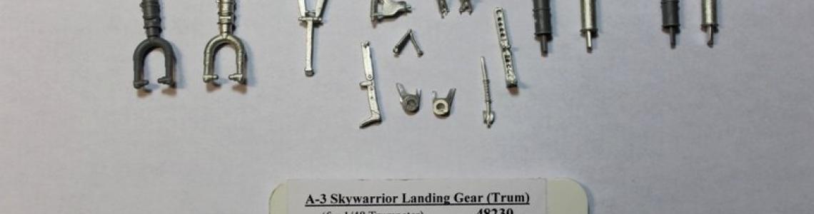 SAC gear set (metal) next to kit gear set (dark plastic)