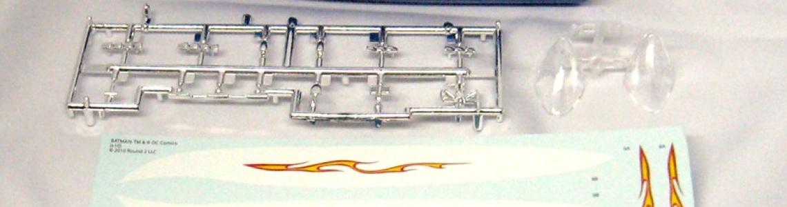 Boat hull, chrome and clear parts with decal sheet