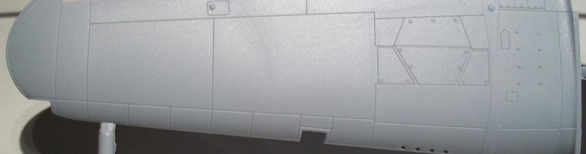 Sprue gate connections to wing of aircraft.