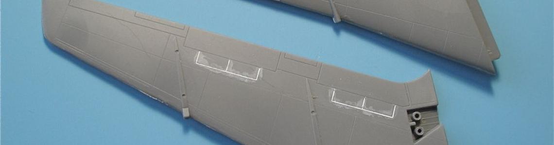 Spoilers were on the wing uppersurfaces only so the lower ones needed to be filled in and sanded smooth