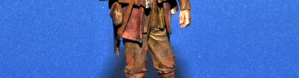 Soldier with slung rifle