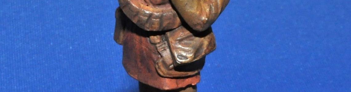 Soldier with rifle on shoulder, back