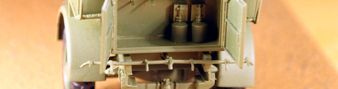 Rear view of truck, access doors open