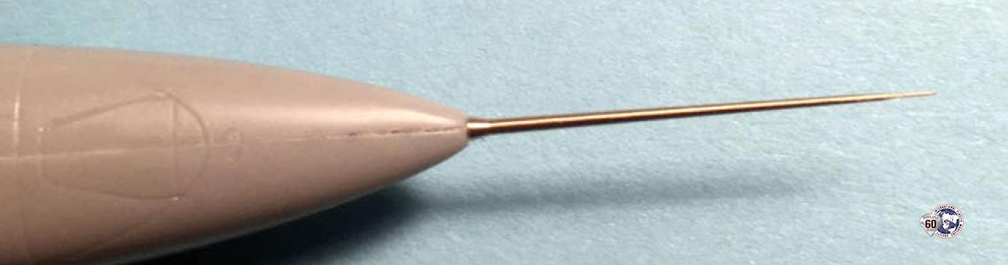 Installed part, after bent tip was corrected by described use of tweezers.