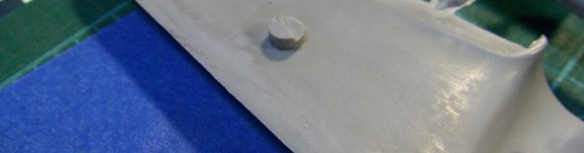 Molded obstruction in wing