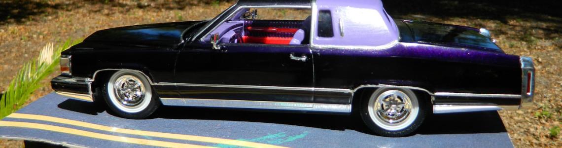 Image of car on pavement in sunlight showing off the House of Color Purple Kandy vinyl top