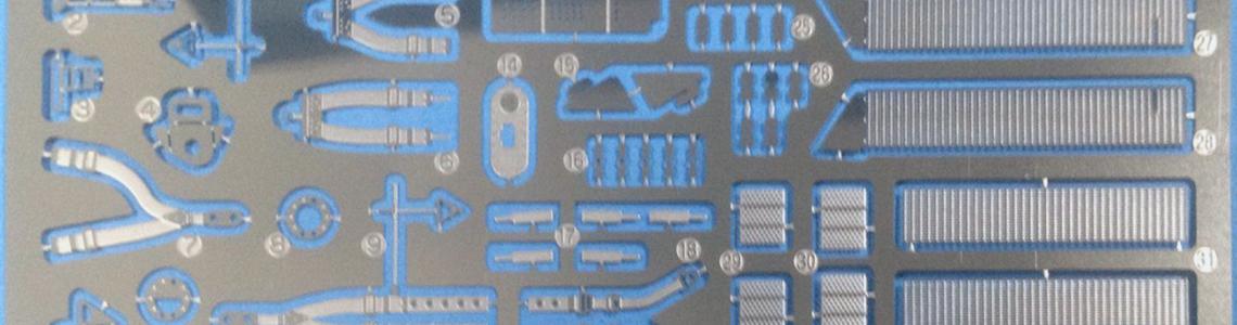 One of two highly-polished photoetch frets with detail parts.