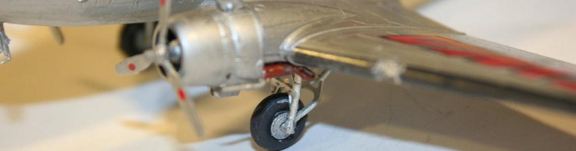 Closer shot of engine, prop, and gear