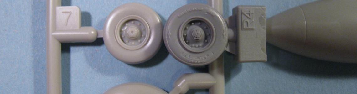 Comparison of outside of kit-supplied front wheel (left) to Eduard wheel (right)