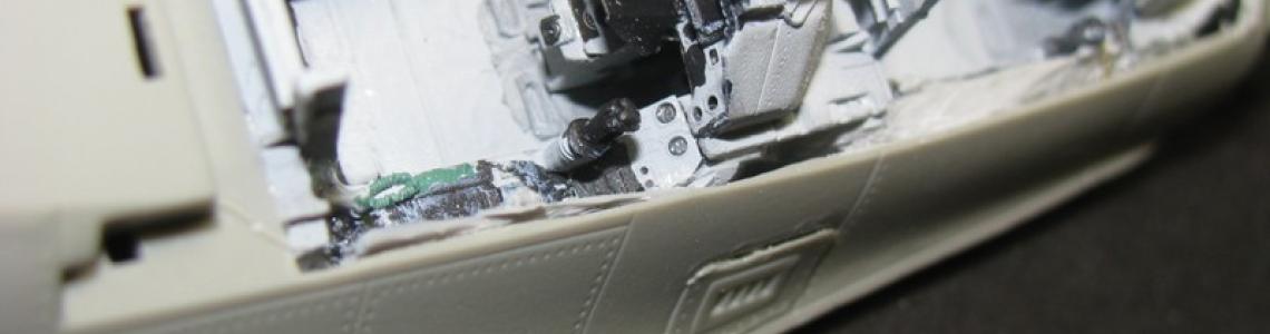 Installed cockpit tub with instrument consoles