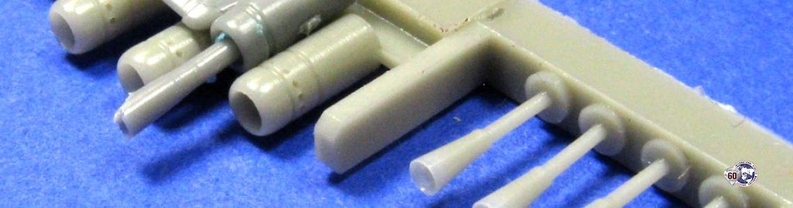 Comparison of standard kit part to resin aftermarket parts