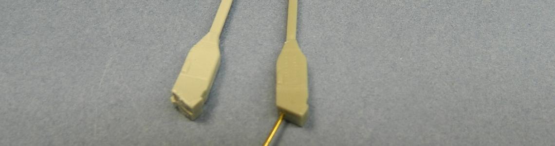 Hook Comparison Kit part on Left