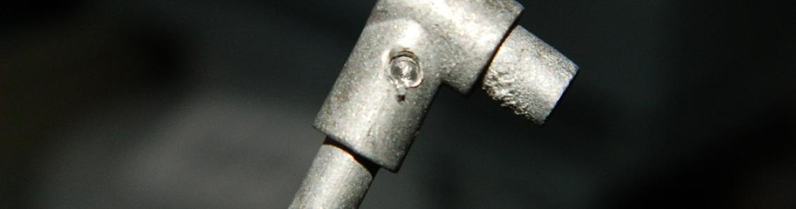 Scissor link after drilling