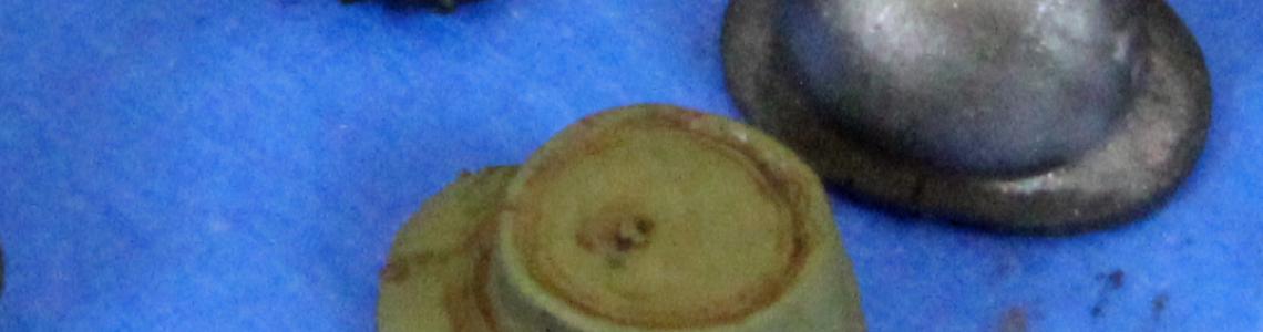 Helmets, hats, and canteens painted appropriately.