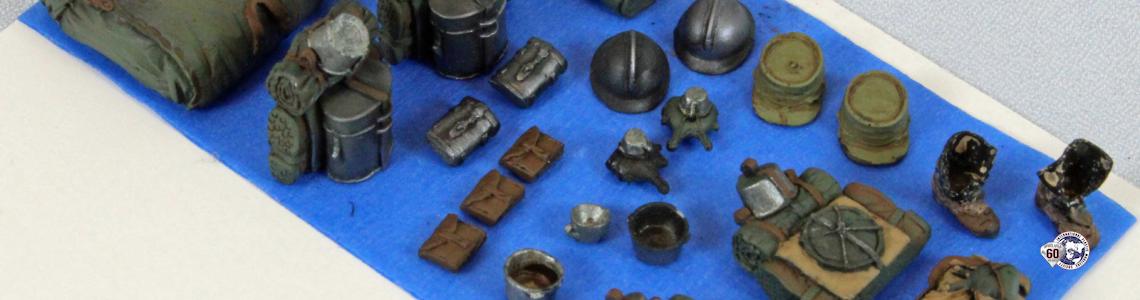 Painted parts laid out on board.