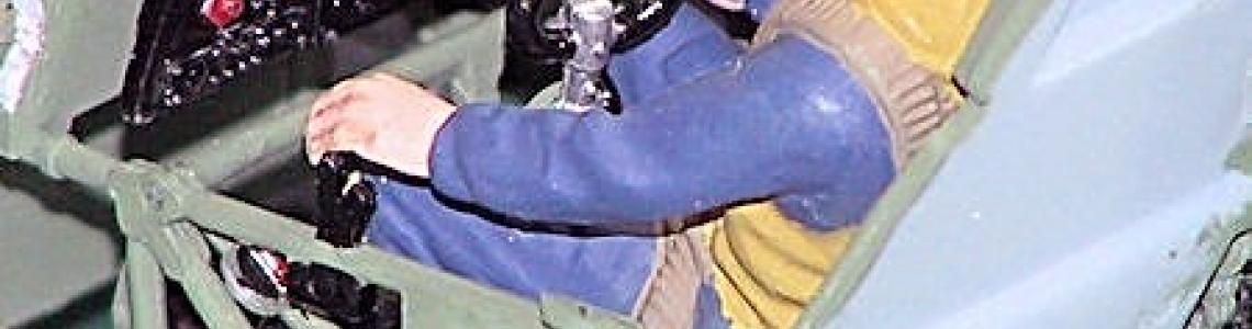 Finished cockpit with instrument panels and pilot figure installed