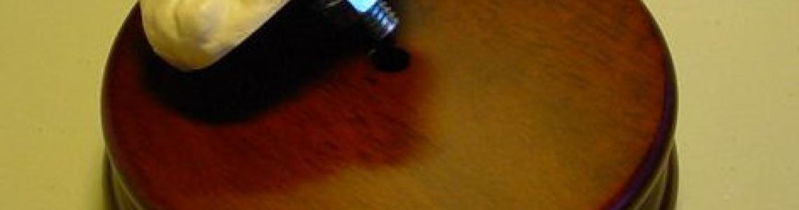 Attaching the resin figure base to the wooden base