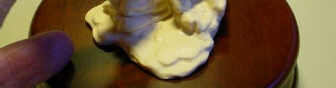 Attaching the figure body to the foundation