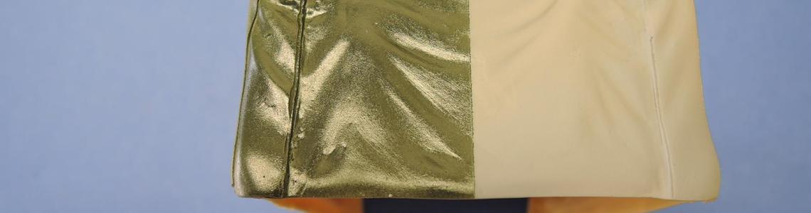 Primer and paint applied to model part