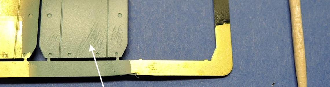 Primer sprayed on metal then painted