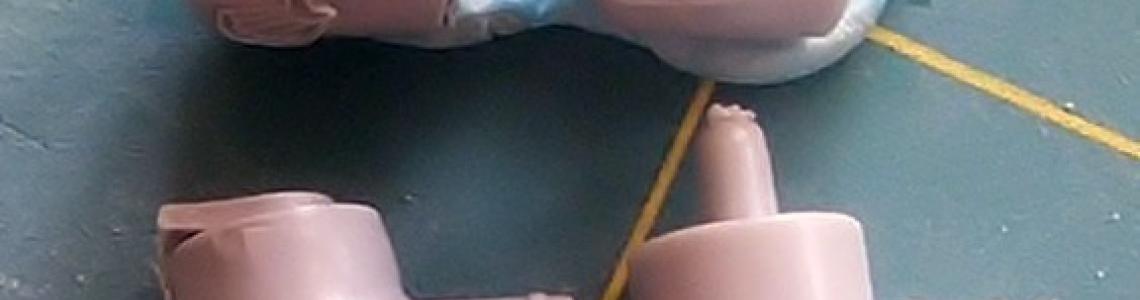 Original kit parts (Rt) compared to review parts