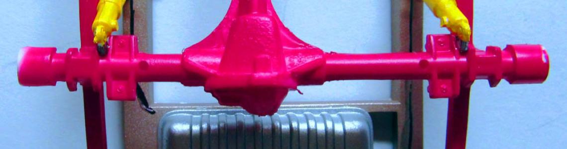 Rear differential, fuel tankes, driveline, and shocks.