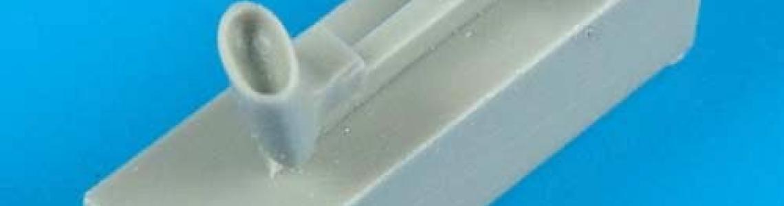 QB parts on casting block