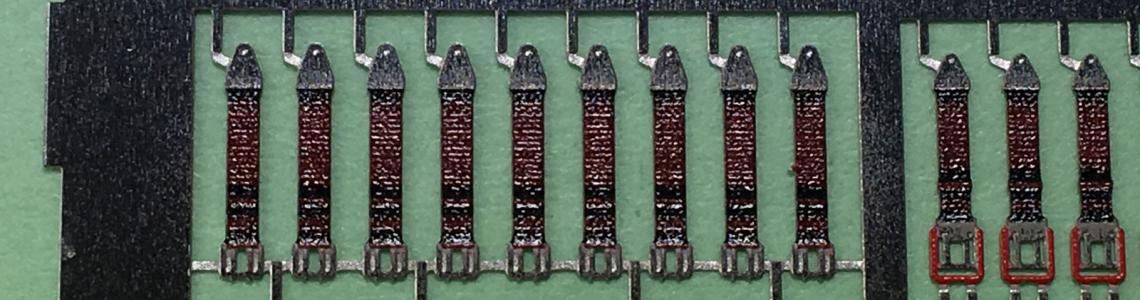 Close-up of photo-etch fret, showing detail of belts