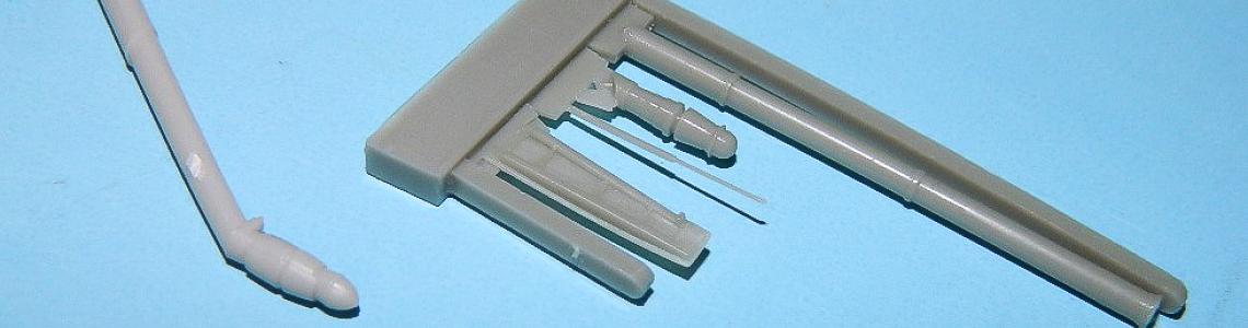 Resin Parts (On Casting Block) Compared to Kit Probe and Door