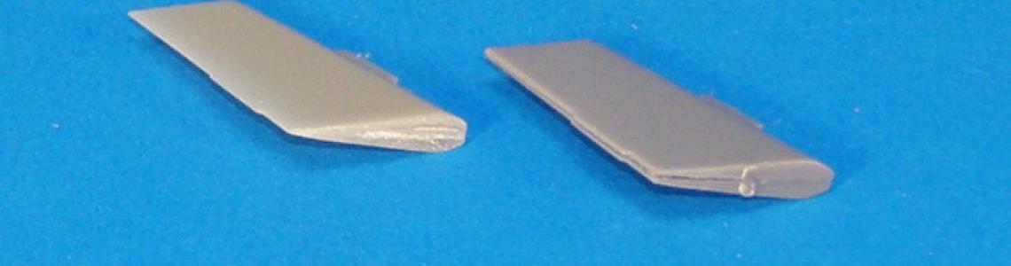 Aires rudder (left) compared to kit part